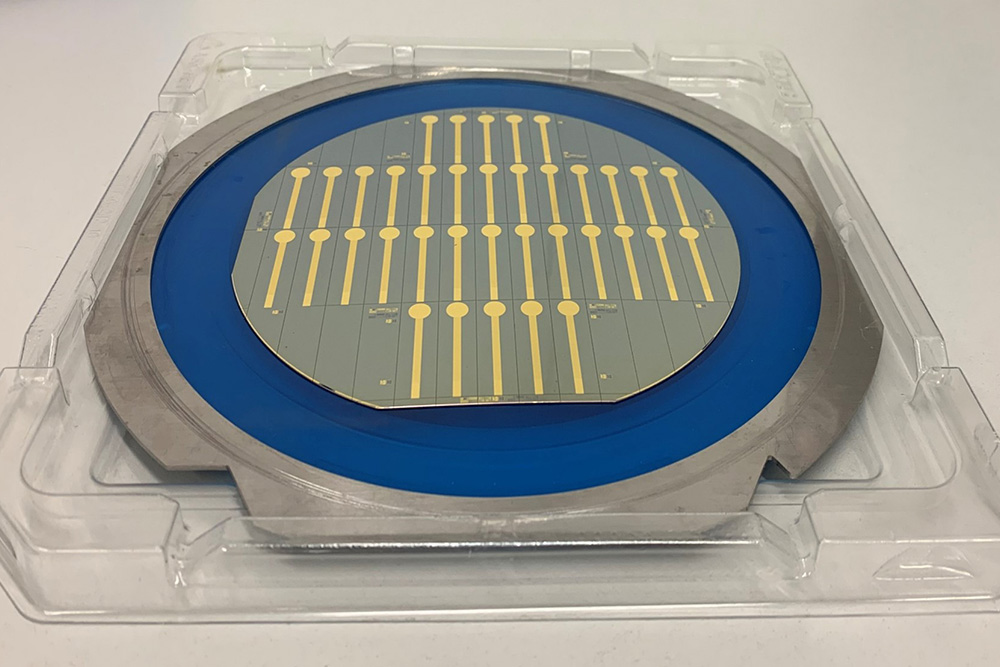 Sensor chips for electrochemical biosensors (gold on silicon).