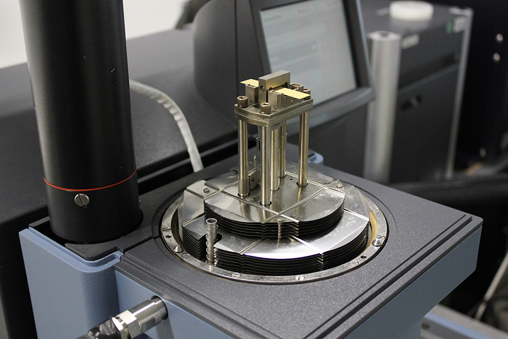 3-point bending measurement of thick film pastes on an aluminum oxide substrate to determine the stiffness of thin films.